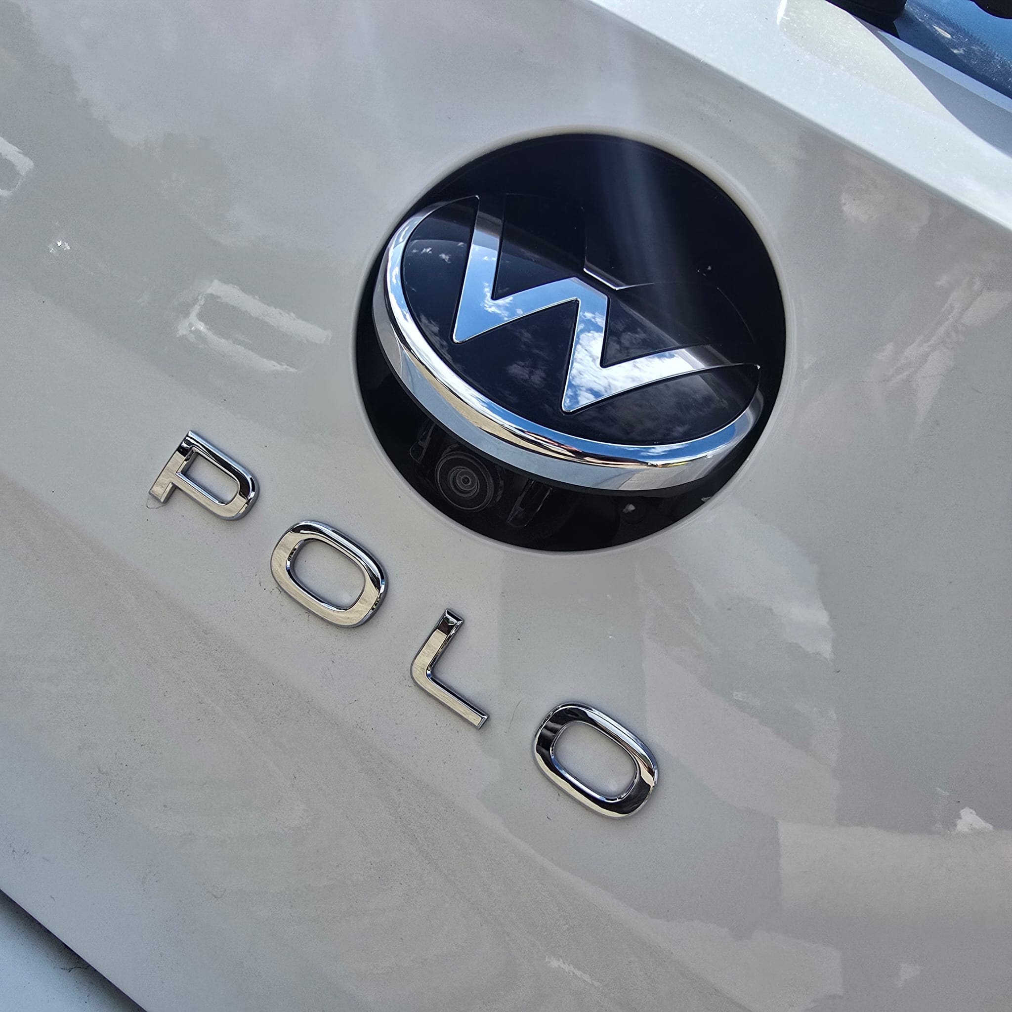 OEM pop-out reverse camera and dash cam installation completed on a VW Polo AW