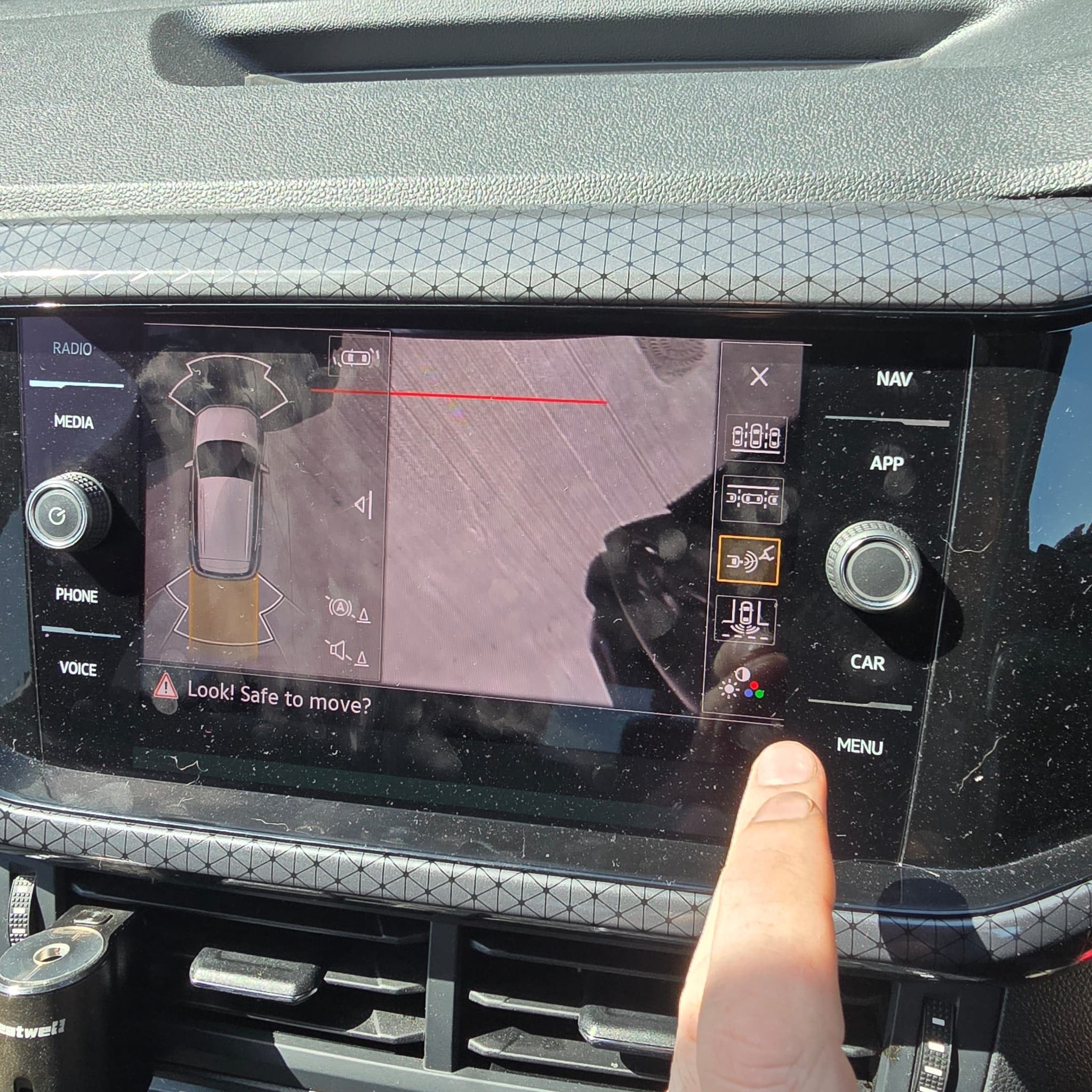 VW T-Cross rear view camera view with calibrated moving guidelines