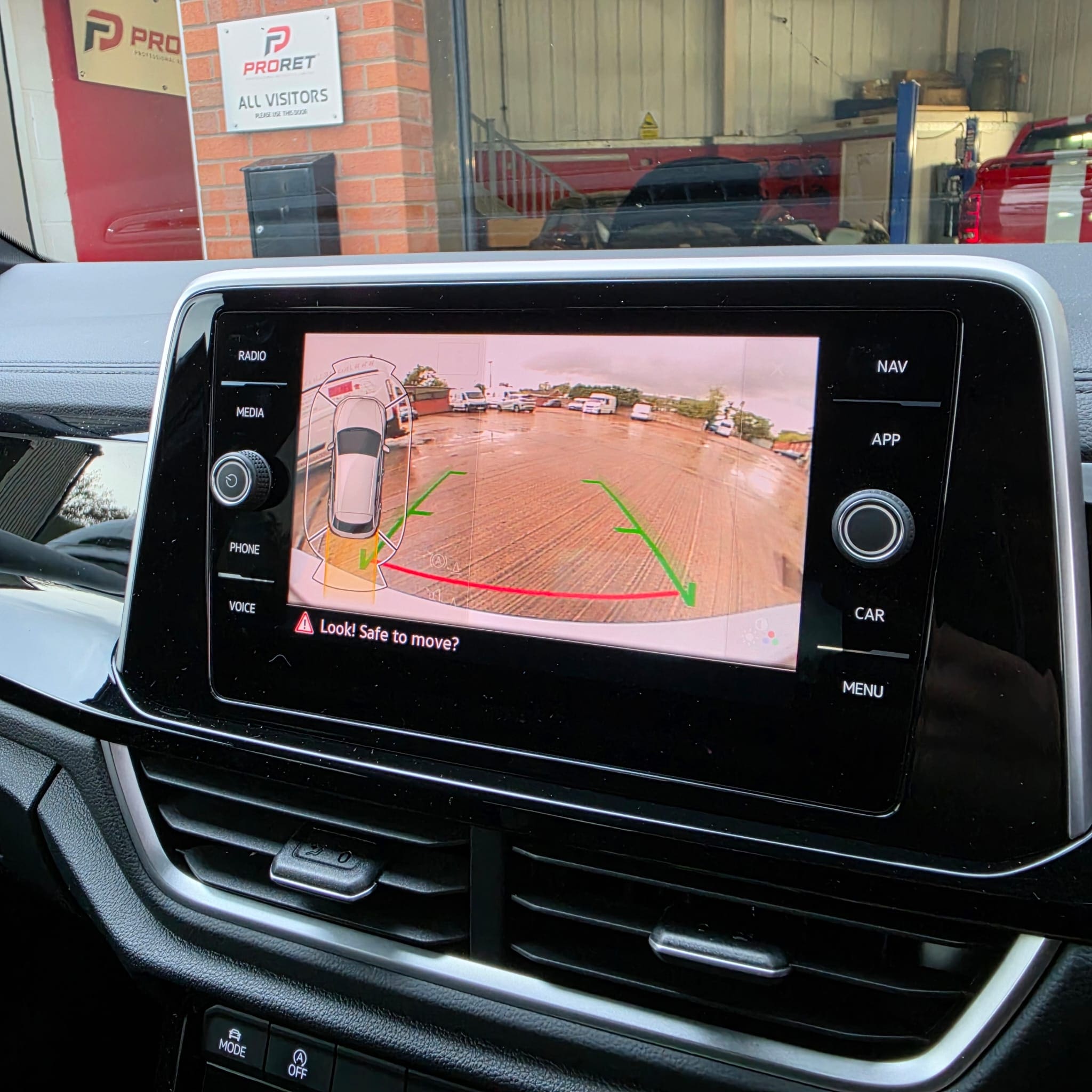 Genuine VW pop-out badge rear-view camera fitted to a VW T-Roc