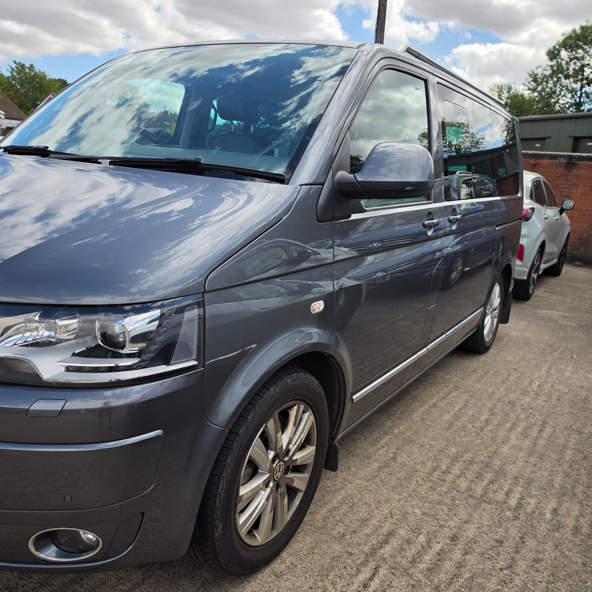 VW T5.1 sliding door repair project showing affected lower door and rail areas