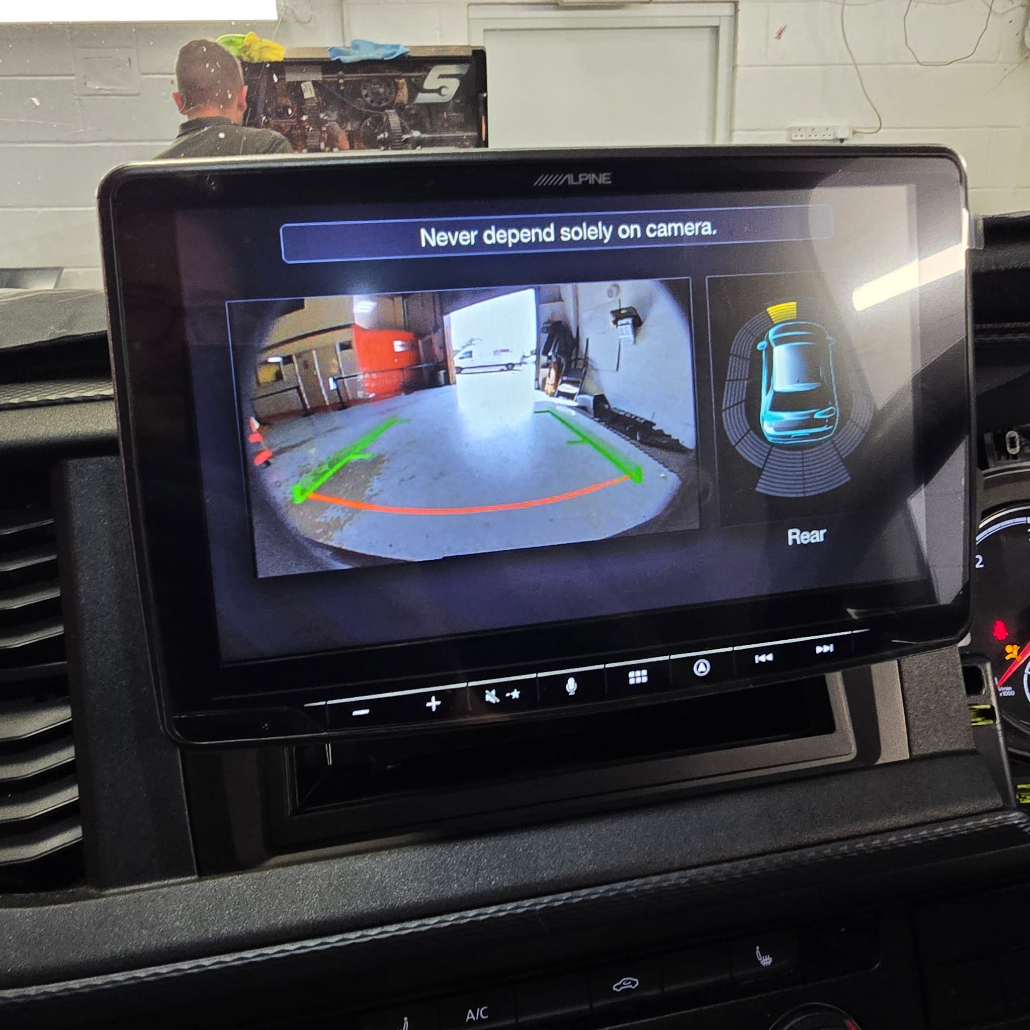 Alpine Halo 9 being fitted into a VW T6.1 with installation kit