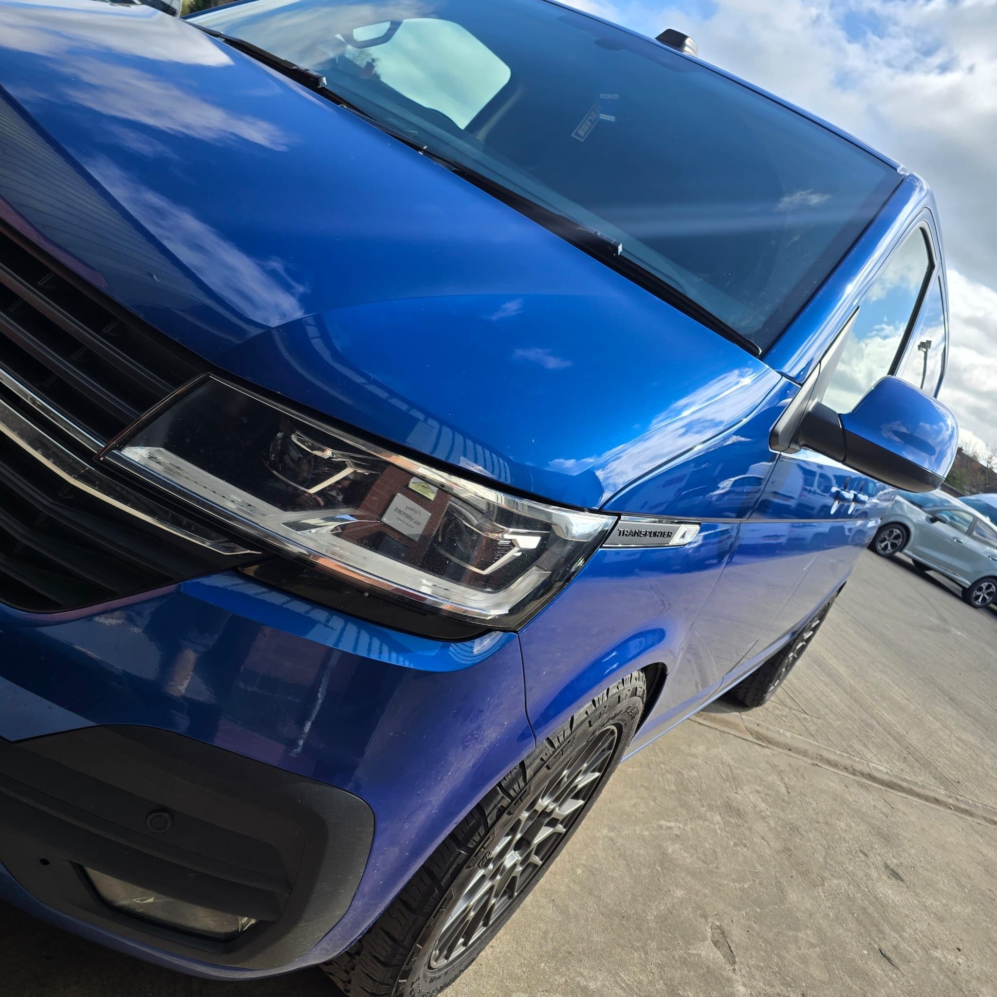 VW T6.1 rear corner view highlighting the smoked LED tail light lens and crisp LED signature