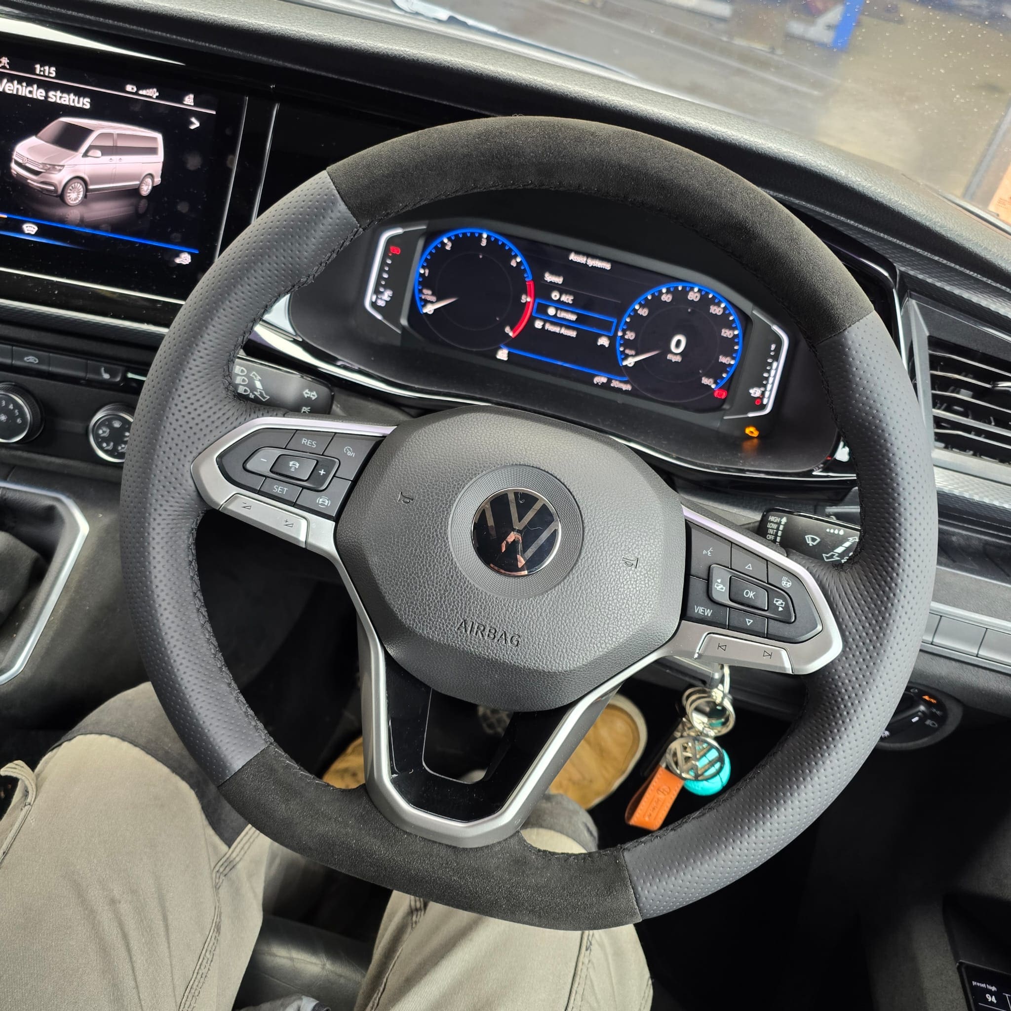 OEM sat nav heat level selection menu showing low mid and high for heated steering wheel