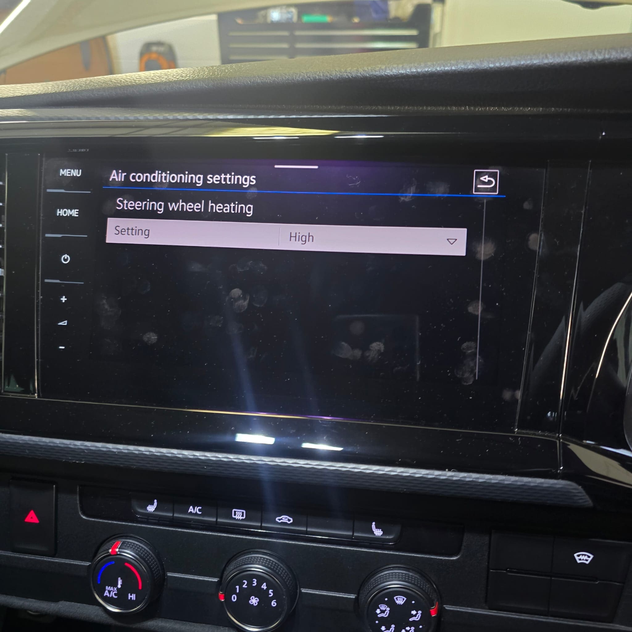 Finished VW T6.1 heated steering wheel with leather and black Alcantara retrim installed