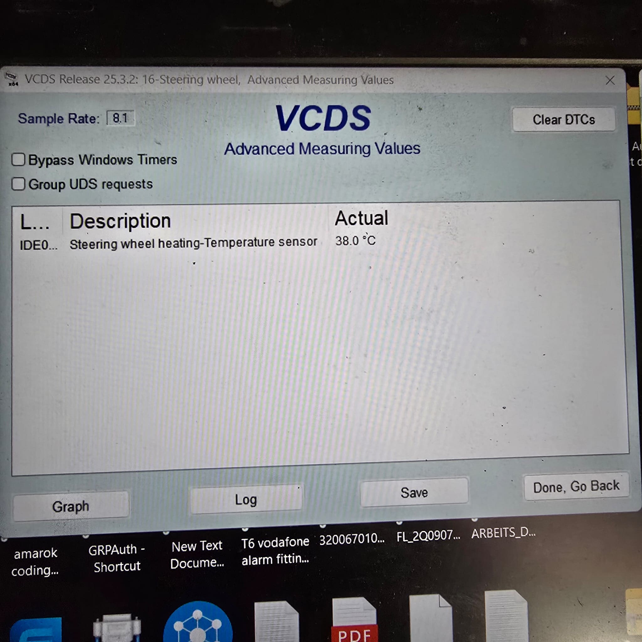 OEM multimedia display showing heated steering wheel status after activation