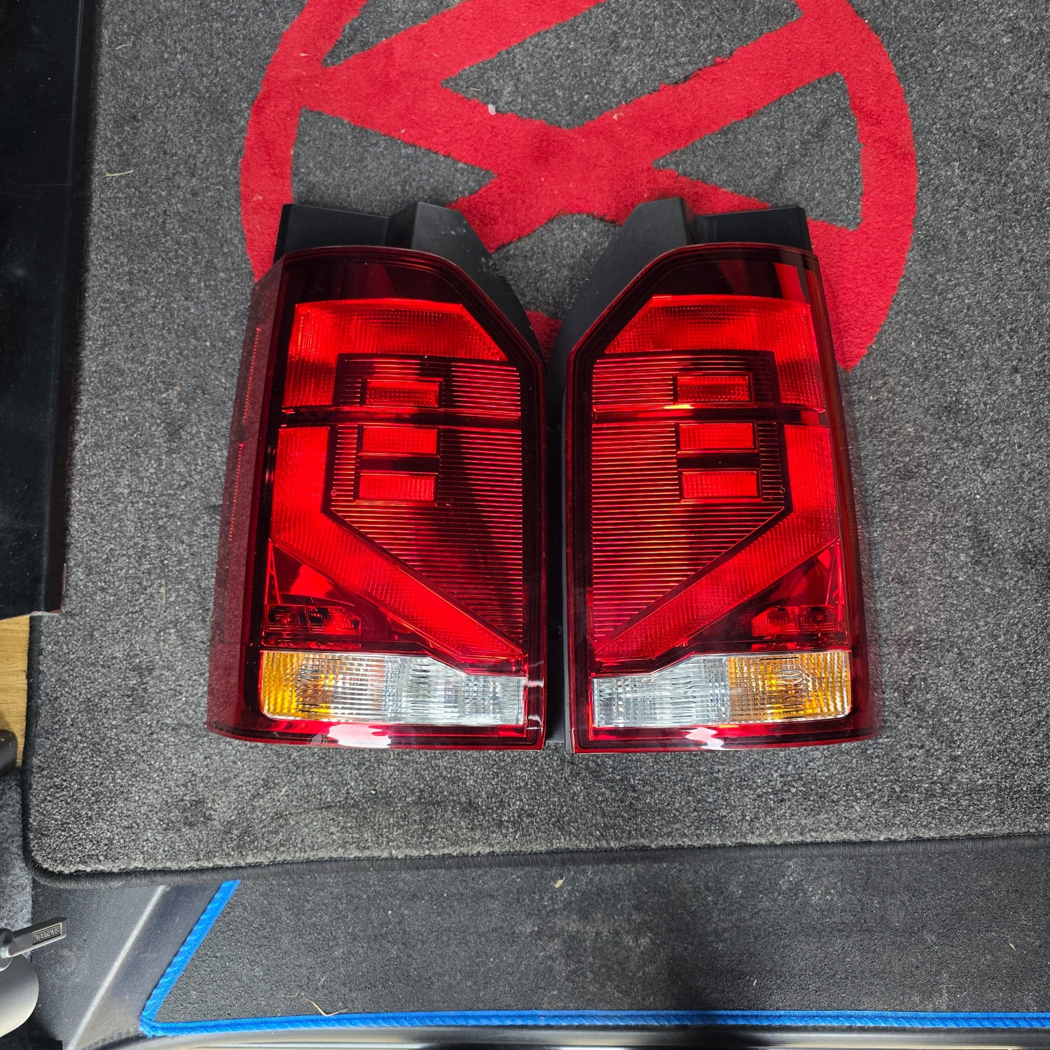 Rear view of VW T6 barn door camper showing the updated aftermarket LED tail light look
