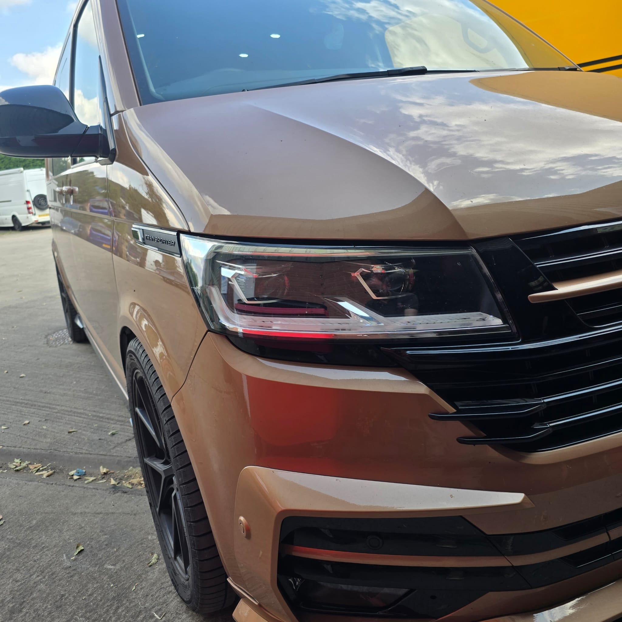 VW T6.1 heated wheel retrofit showing OEM stereo heat control compatibility