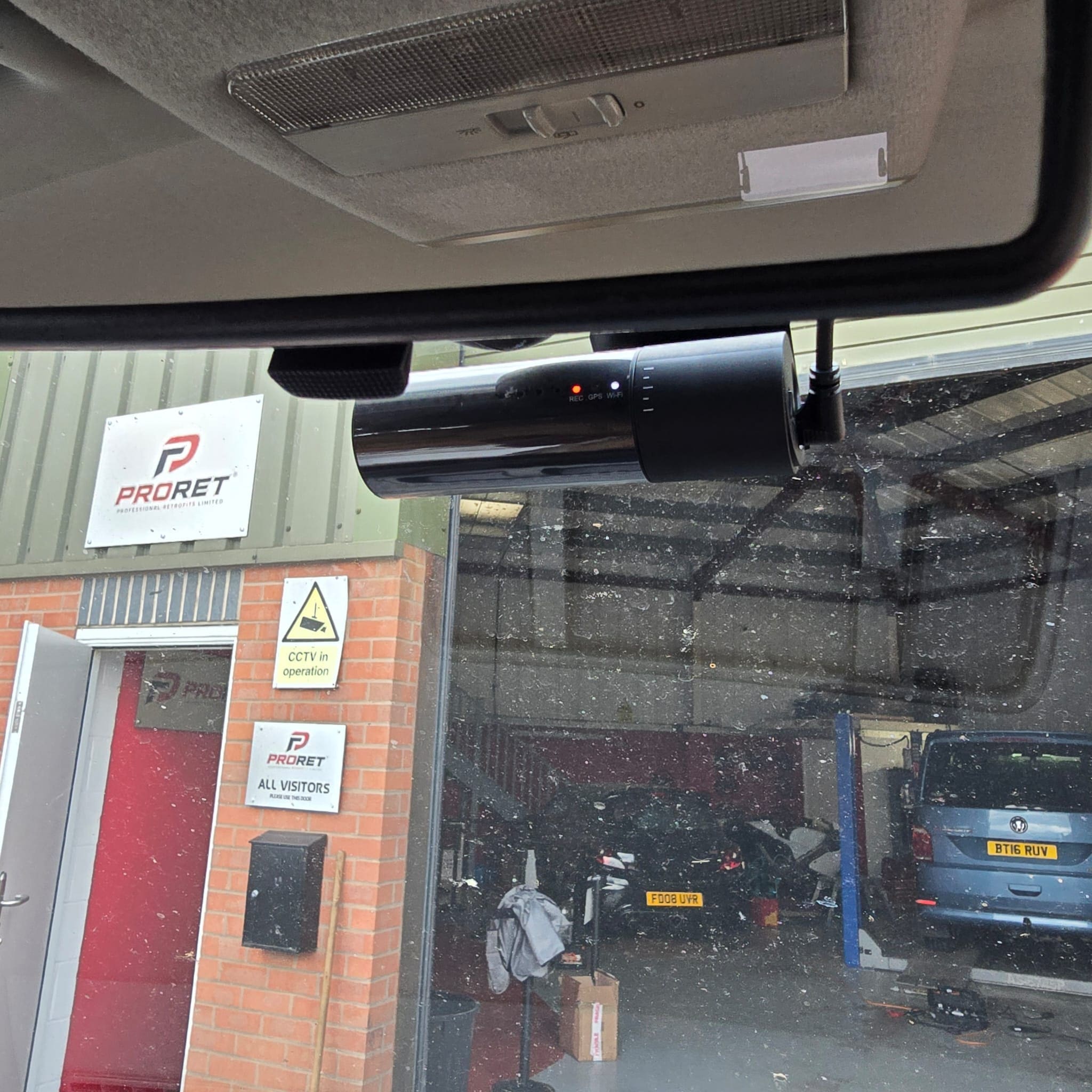 Rear to front wiring work underway on a VW Transporter motorhome camera and dash cam installation