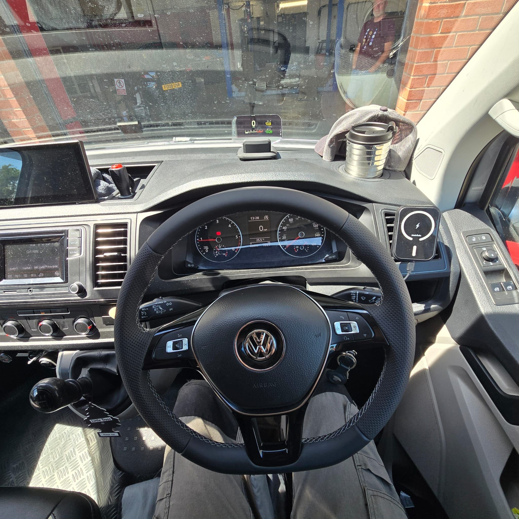 Retrimmed VW Transporter steering wheel with audio dash and phone controls installed
