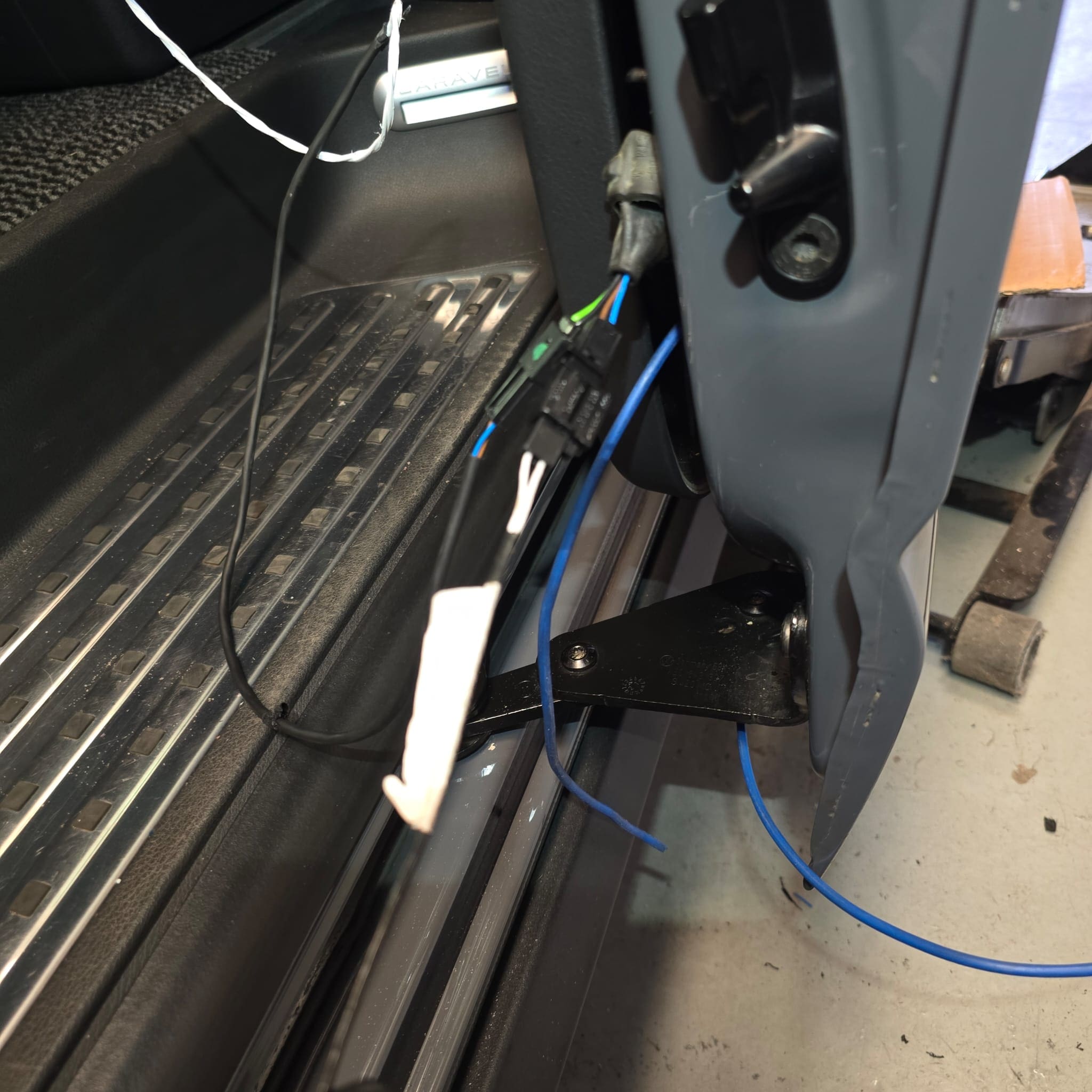 Workshop photo of VW Transporter sliding door pinch sensor replacement