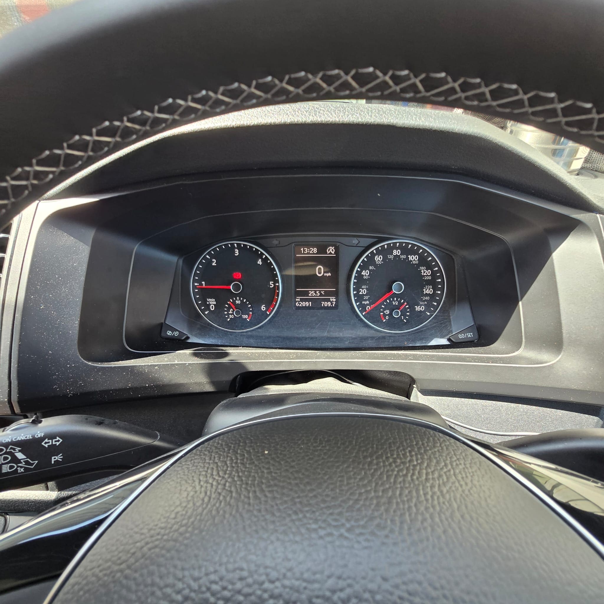 Retrimmed multifunction steering wheel fitted to a VW Transporter with audio and dash controls