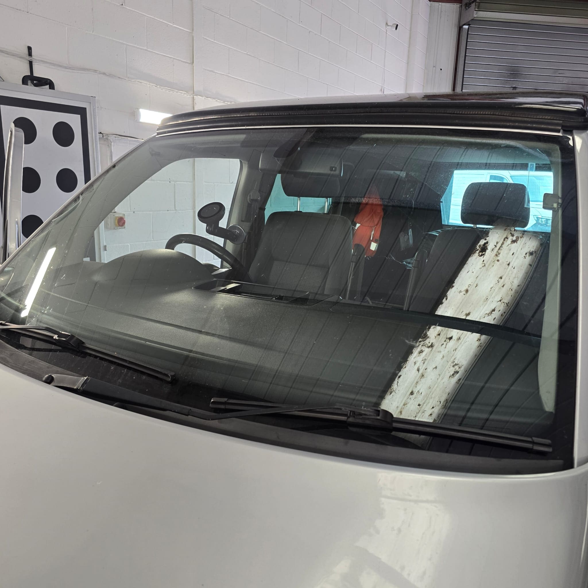 Factory style heated screen retrofit completed on a Volkswagen Transporter T5