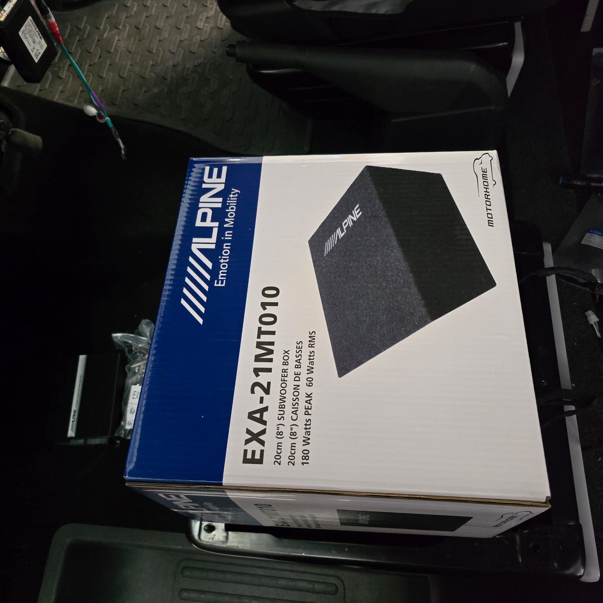 Passenger seat area in a VW Transporter T6.1 prepared for an Alpine under-seat bass upgrade