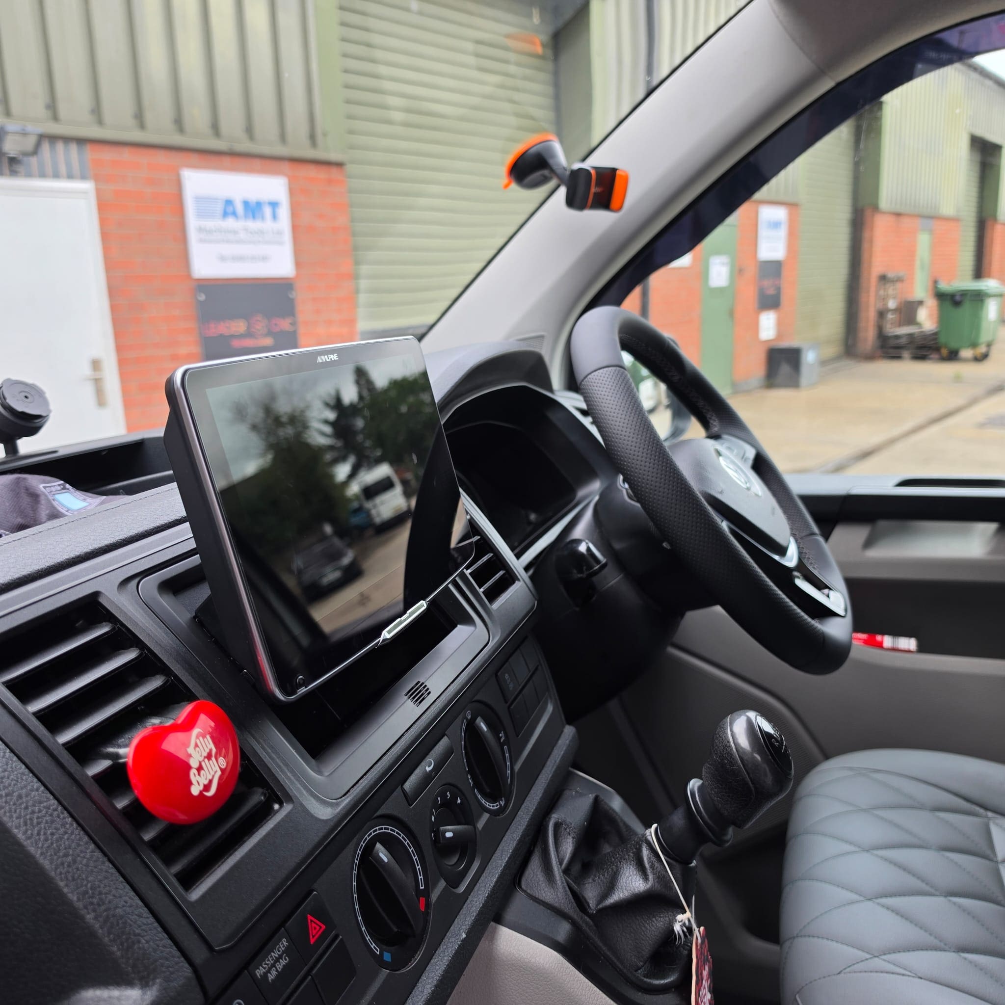 Completed Volkswagen Transporter T6 upgrade package with multimedia screen and interior retrim