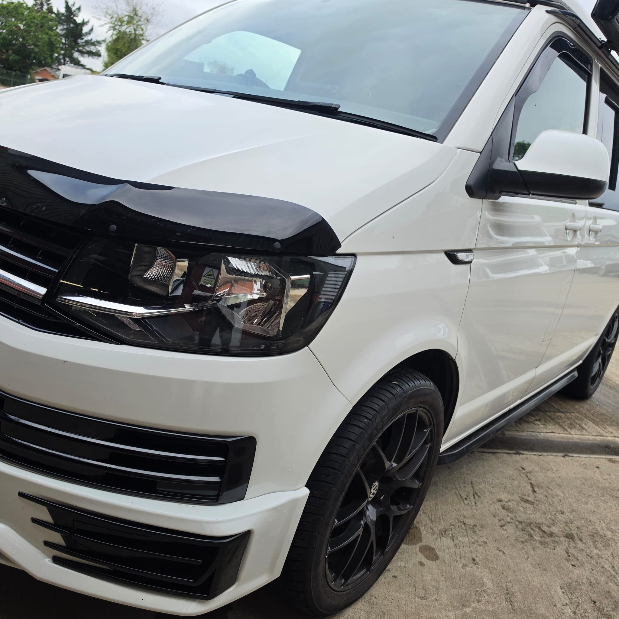 White Volkswagen Transporter T6 upgraded with Alpine Halo 9 and adaptive cruise control activation