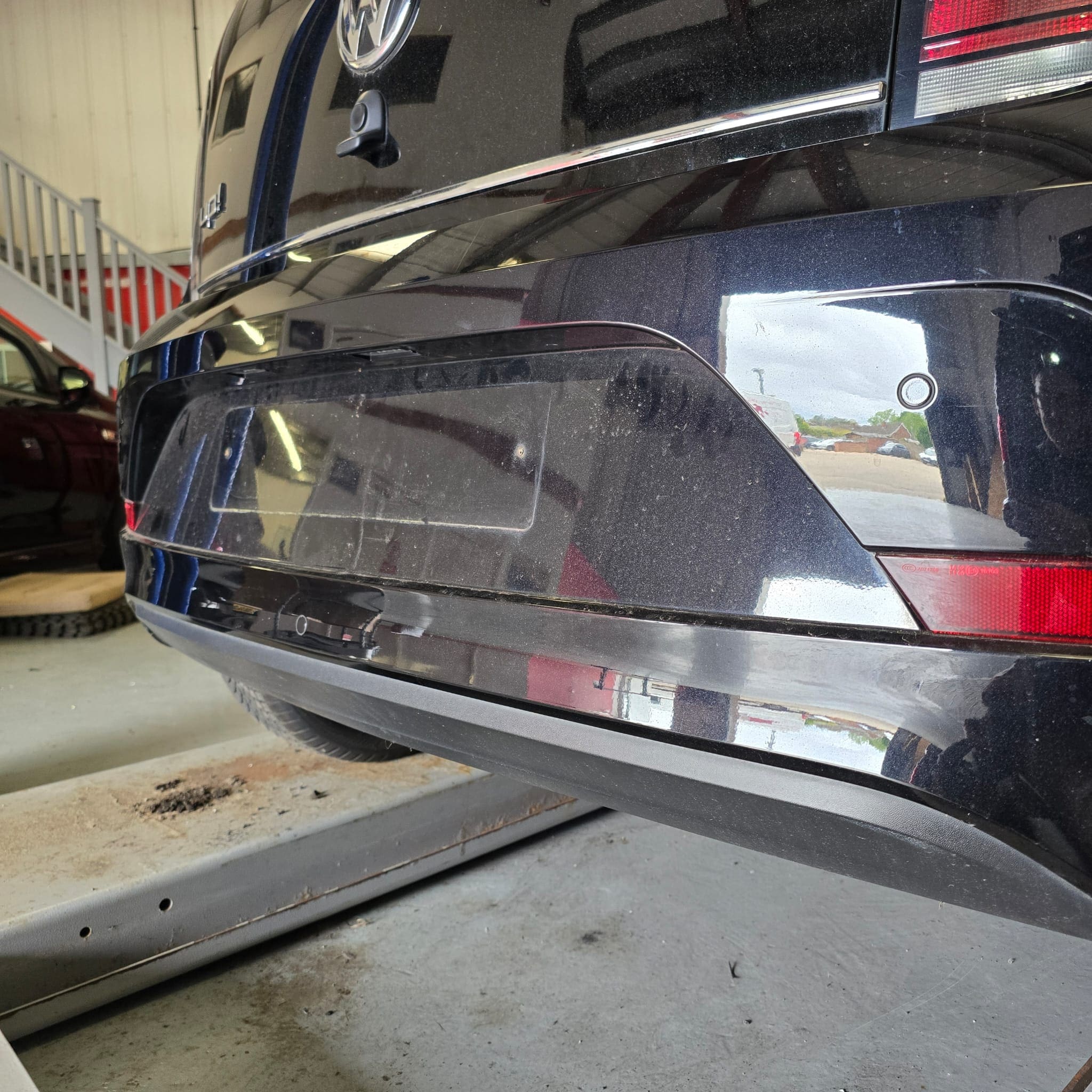 VW Up retrofit completed with rear OEM parking sensors installed using a genuine VW optical sensor kit