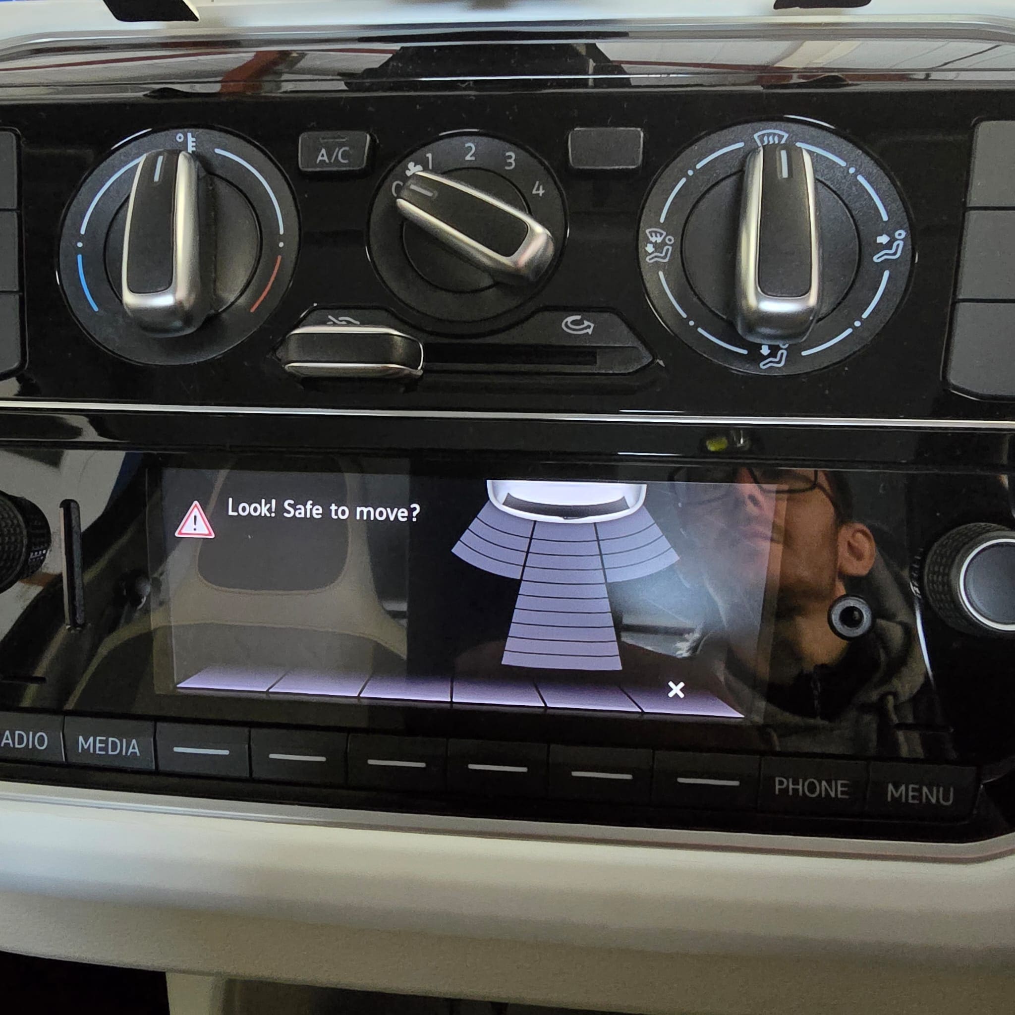VW Up rear bumper area after OEM parking sensor retrofit with customer-supplied genuine VW optical sensor kit