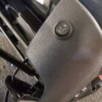 Heated seat control switch fitted to seat base panel