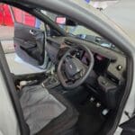 Aftermarket heated seat temperature switch mounted in seat base trim