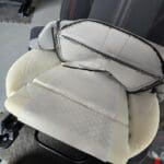 Aftermarket heated seat elements fitted beneath vehicle seat upholstery