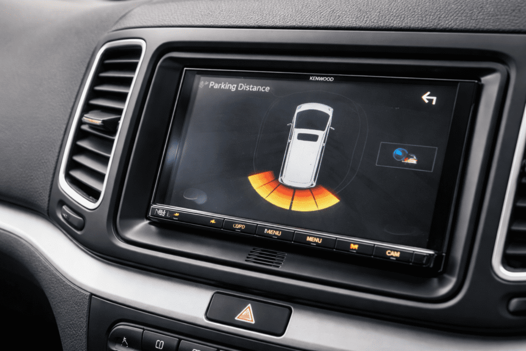 Aftermarket car stereo with parking sensor graphics display