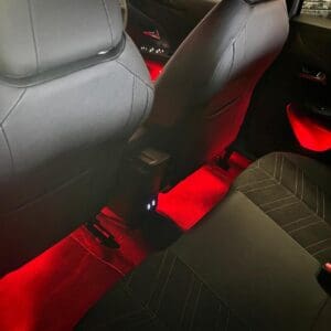 Close-up of LED ambient lighting strip in door card