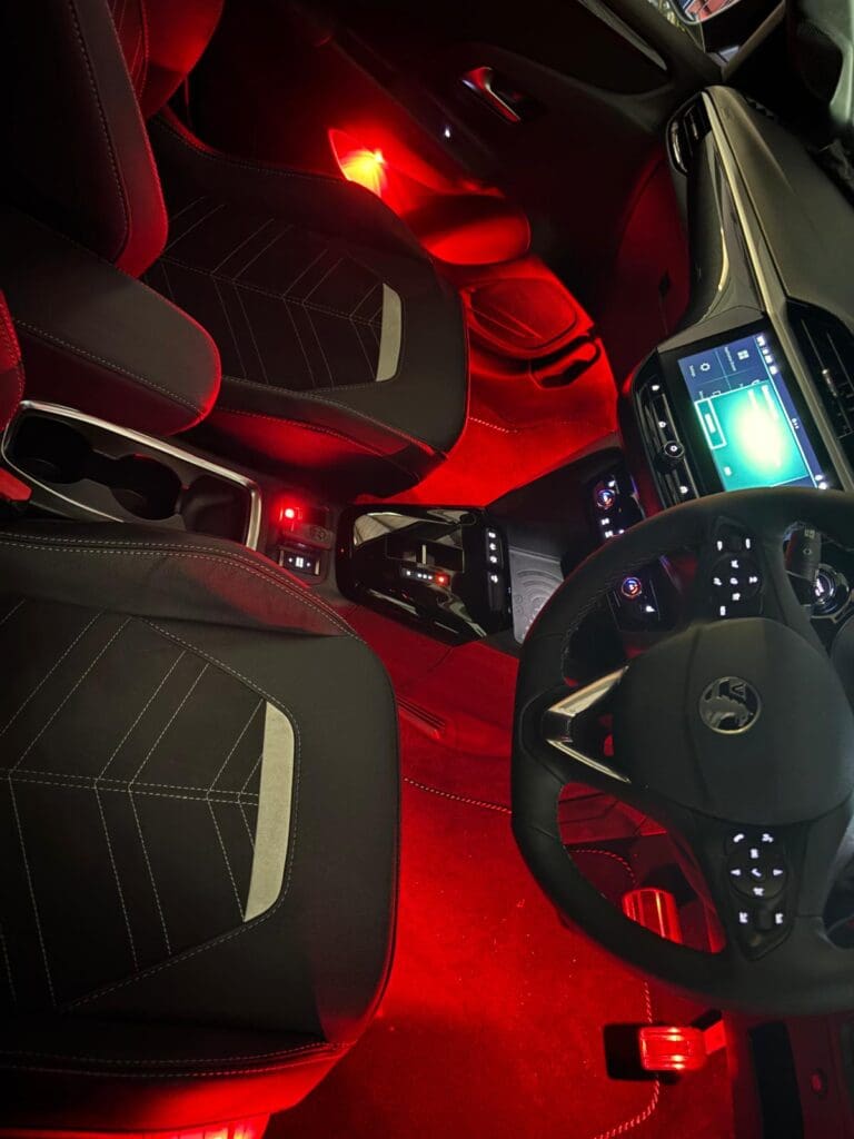 Interior ambient lighting dimmer switch installation in vehicle