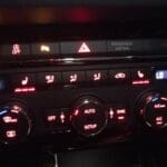 SEAT Leon climate control panel with retrofitted heated seat buttons