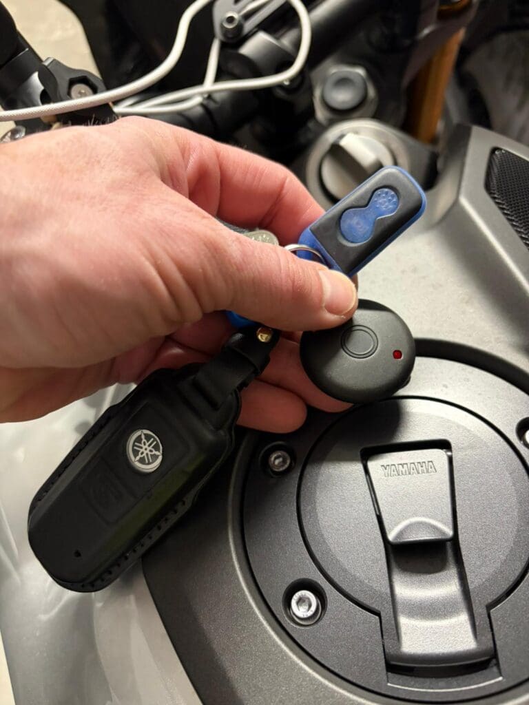 Motorcycle alarm installation Midlands with DEFCOME B9.5 system and compact remote control fitted to Yamaha motorbike