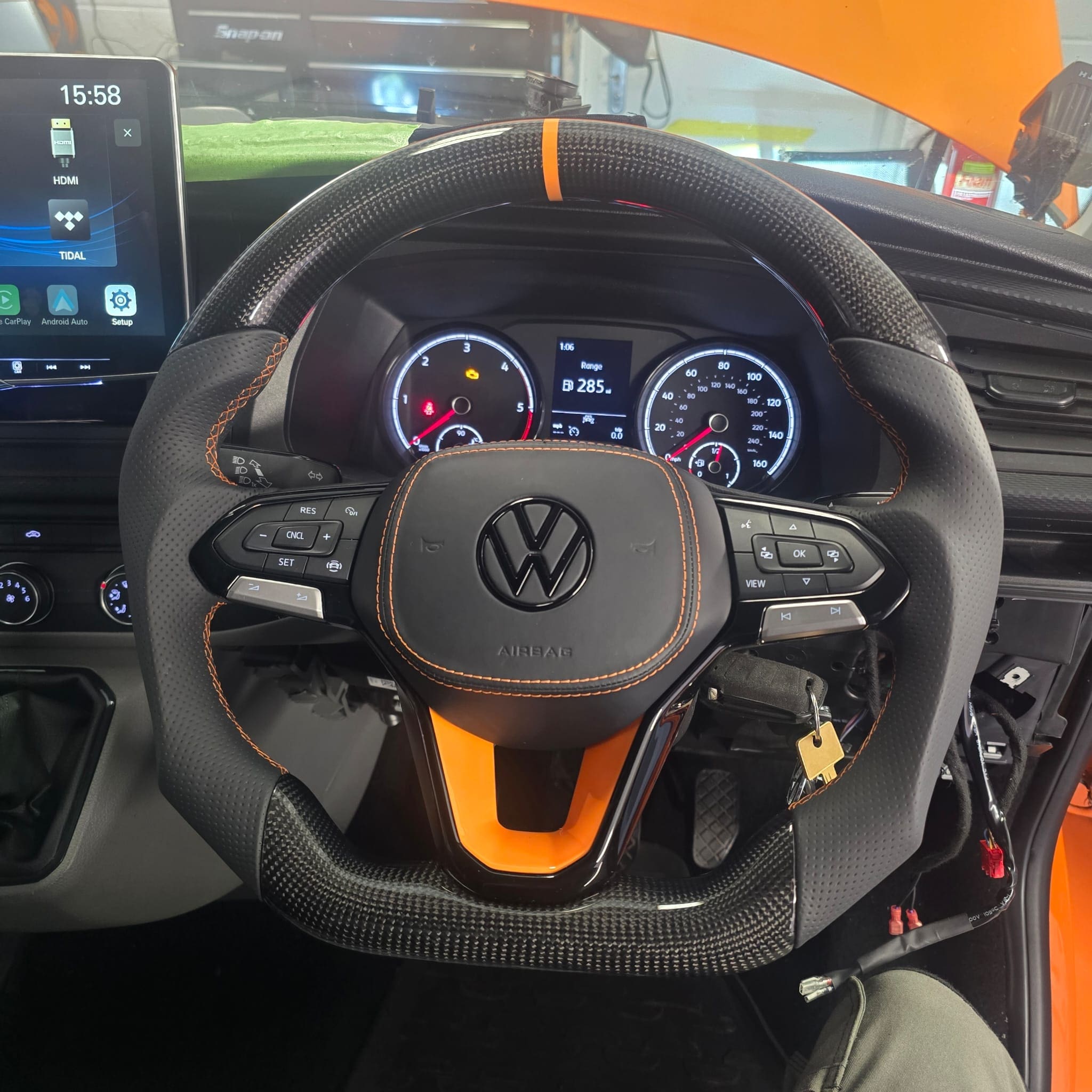 uk-handmade-carbon-fibre-steering-wheel-retrofit-orange-stitching