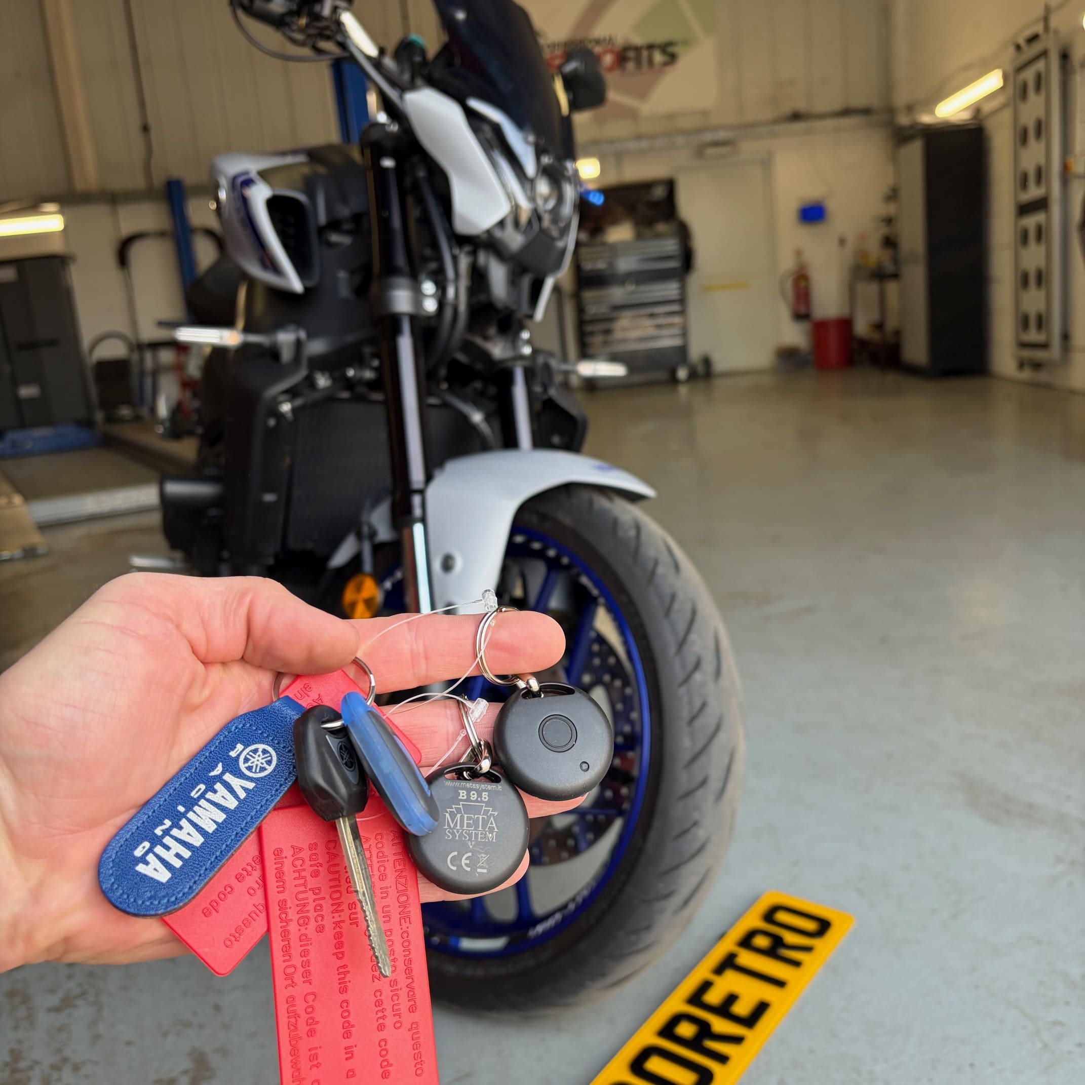 Yamaha motorbike in the workshop for alarm wiring correction and META tag programming